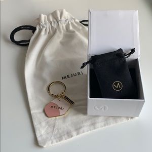 Mejuri box, sack, and keychain
